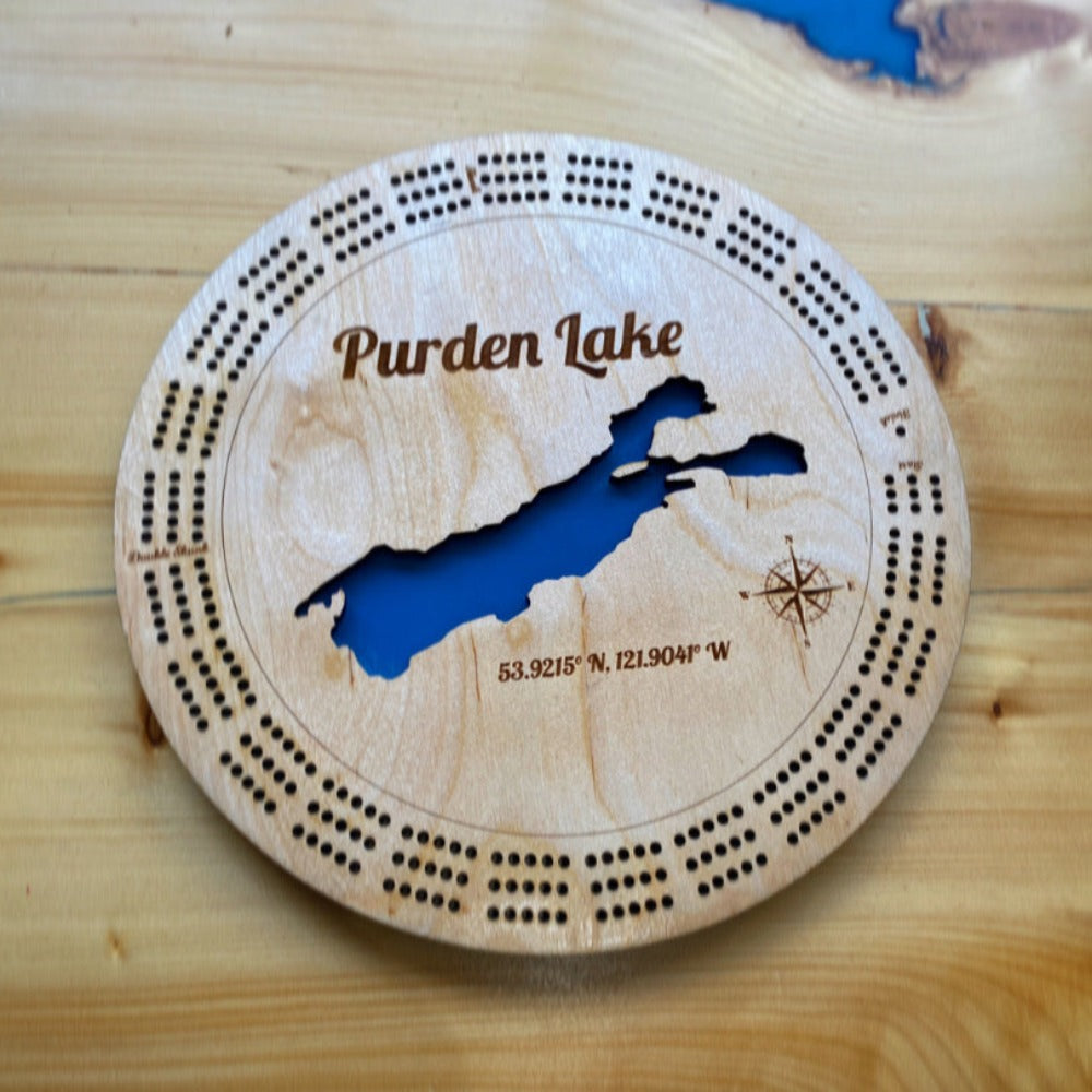 Laser-engraved Purden Lake crib board on Baltic Birch, topographic lake map design — custom Canadian gift