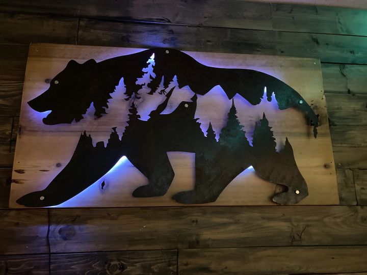 Grizzly Bear Mountain Scene on Cedar with Back Lighting